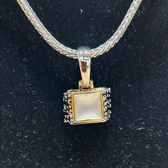 Elegant Gold and Silver Pendant Necklace